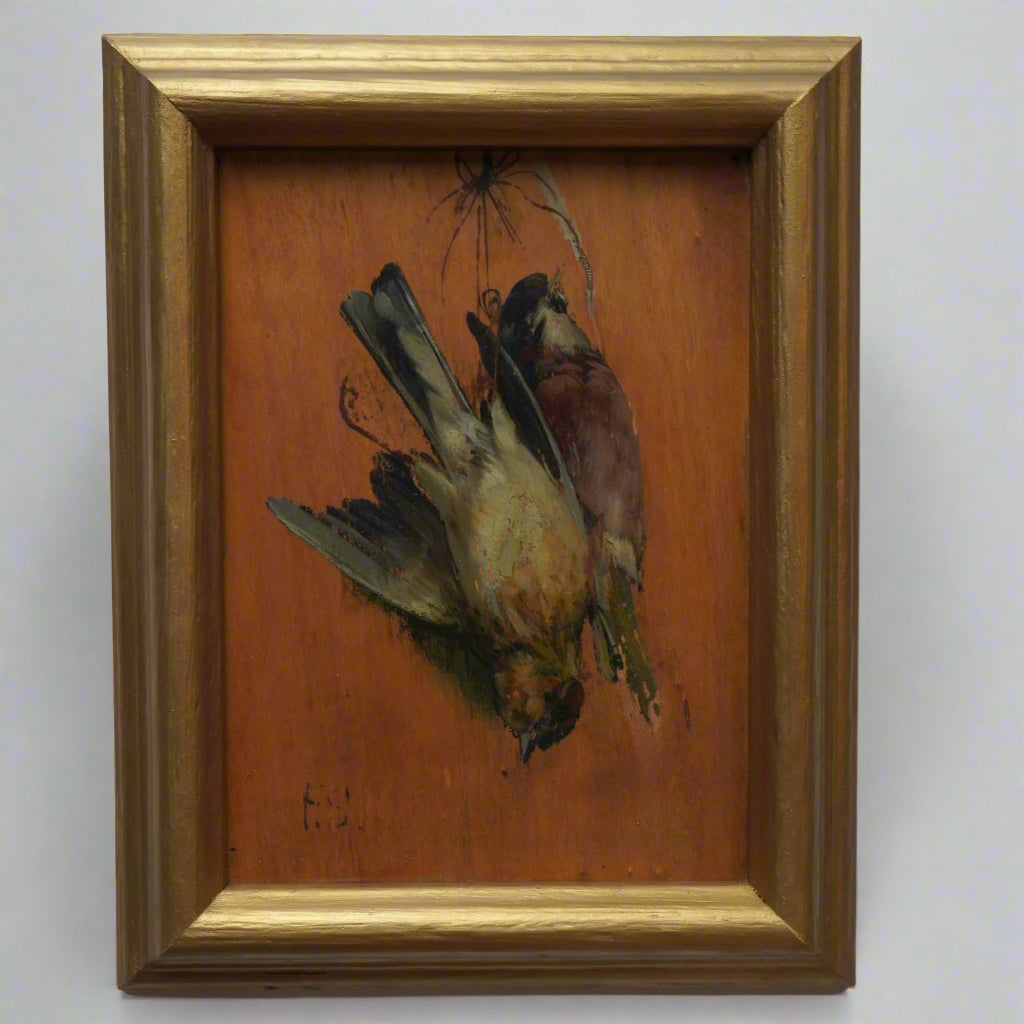 Painting of two birds on a wooden panel with a gold frame.