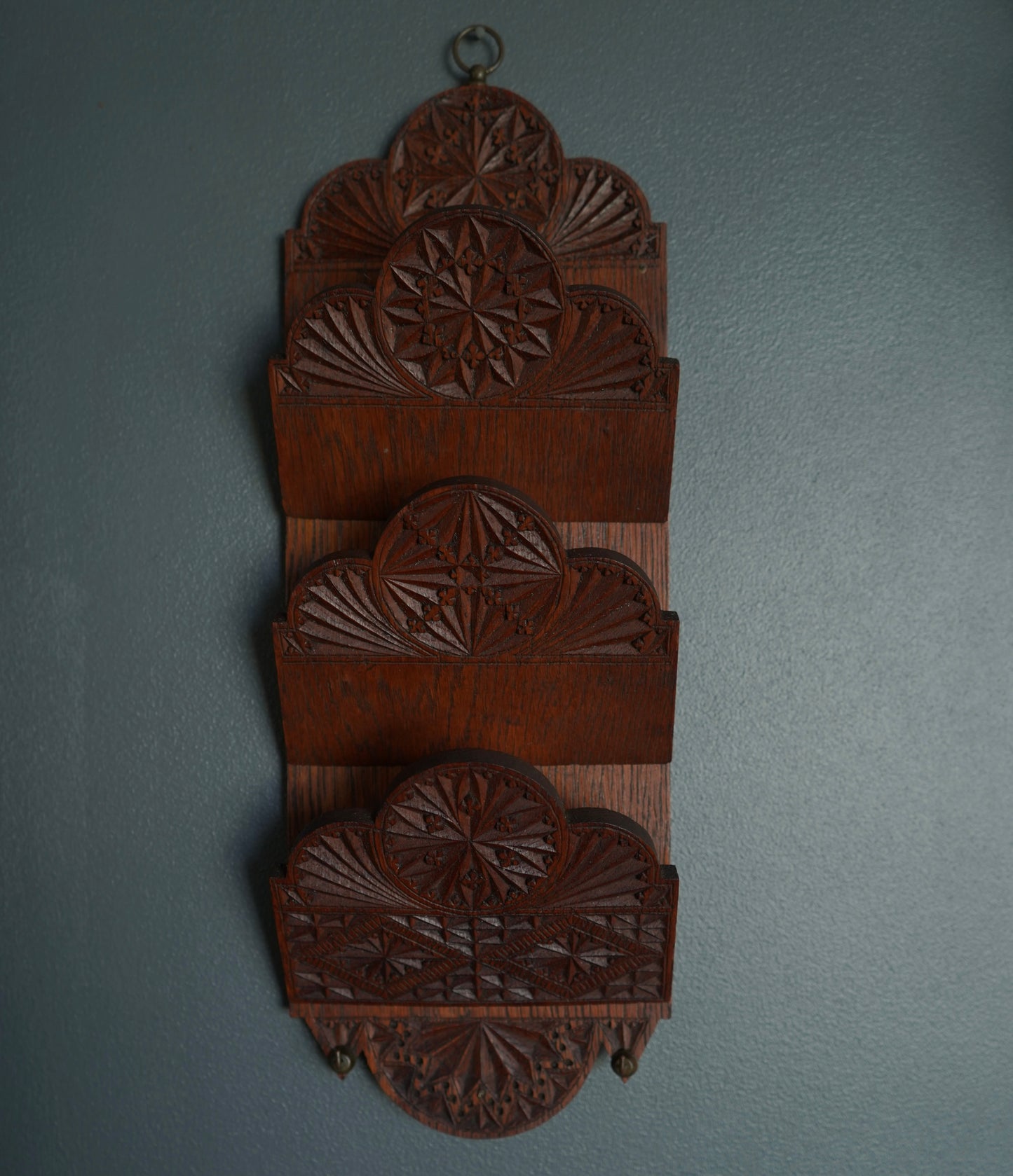 Wooden mail holder with hand-carved intricate carvings and two metal hooks