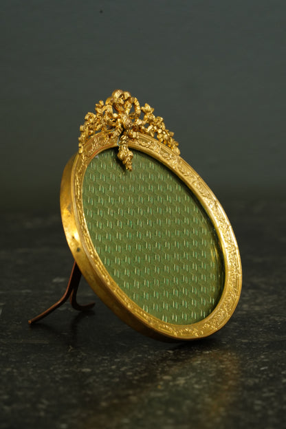 Antique French Gilt Brass Oval Picture Frame with Bow Crest